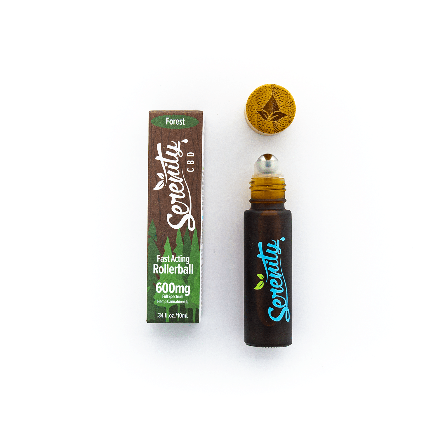 Serenity CBD Forest Blend Roller shown open next to its box—highlighting convenient, plant-powered aromatherapy and soothing topical relief