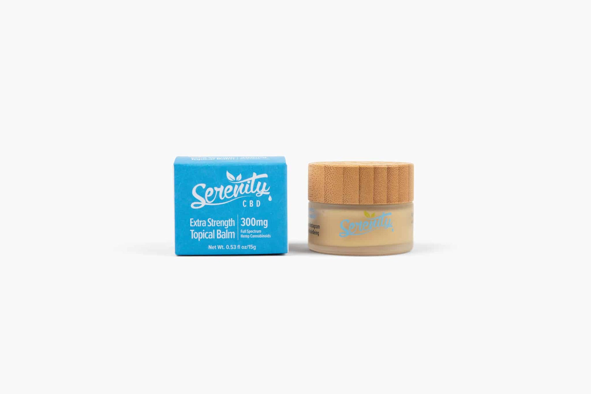 Serenity CBD Topical Balm jar with bamboo lid and box on a white background—formulated for soothing targeted relief and natural skin nourishment
