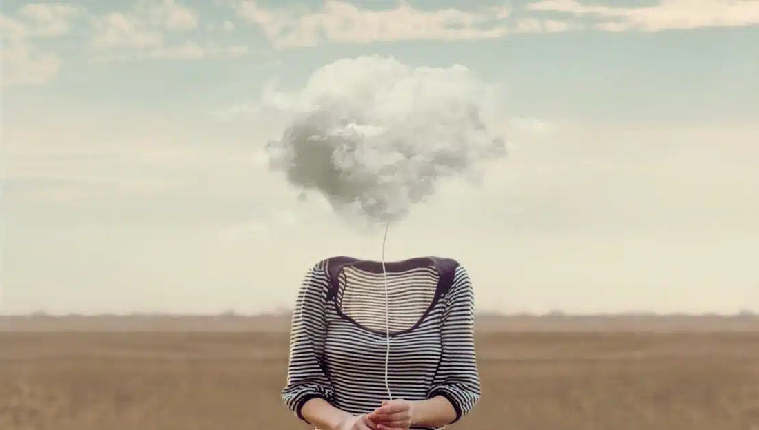 An illustration representing brain fog shows a woman's body with a cloud of fog covering her head."