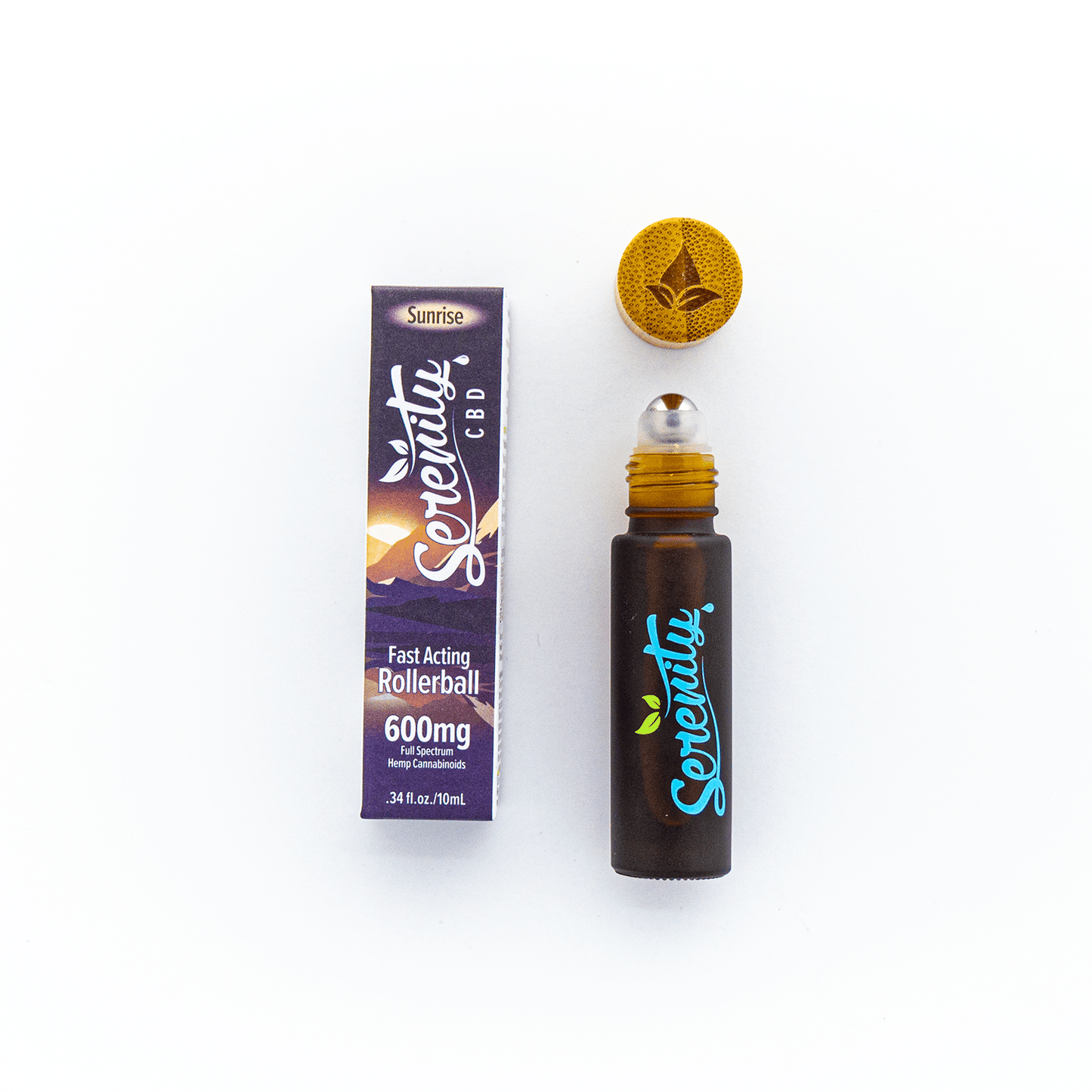 Serenity CBD Sunrise Blend Roller shown open next to its box—highlighting convenient, on-the-go application for refreshing balance and relief