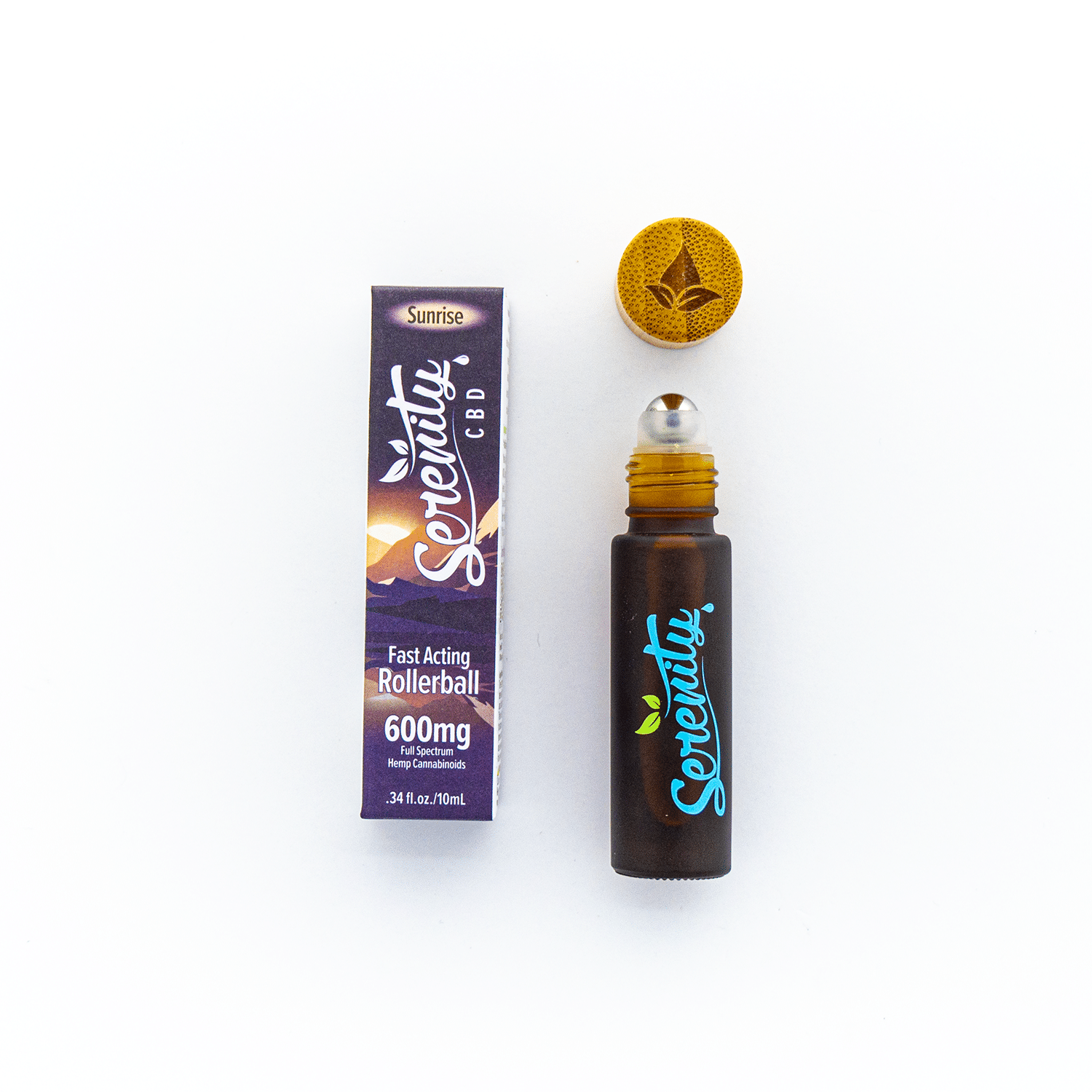 Serenity CBD Sunrise Blend Roller shown open next to its box—highlighting convenient, on-the-go application for refreshing balance and relief