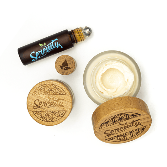 Serenity CBD Topical Care Bundle featuring a soothing balm in a bamboo-lid jar and a roller applicator—designed for targeted relief, skin nourishment, and natural self-care