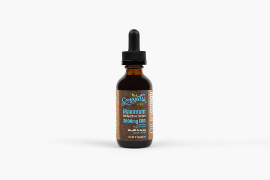 A bottle of Serenity CBD 3000mg Tincture with a dropper, set against a serene, natural background.